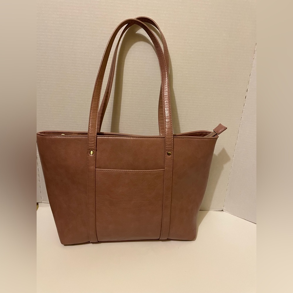 Antik Kraft mauve purse.